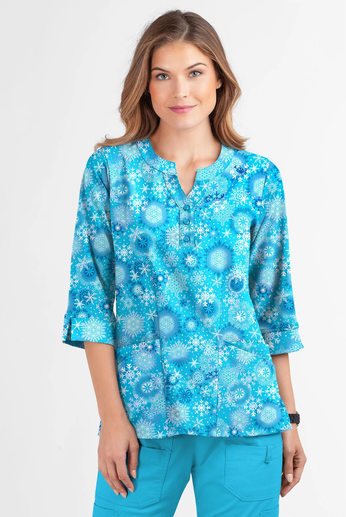 Butter-Soft Dazzling Snowflakes Turquoise Women's 2-Pocket Round Neckline Print Scrub Top 2 Butter-Soft Dazzling Snowflakes Turquoise Women's 2-Pocket Round Neckline Print Scrub Top - Image 2